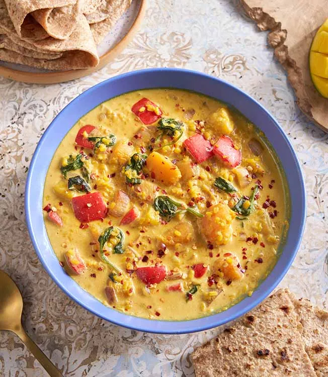 Moong Dal mit Kürbis, Mango und Kokosnuss
